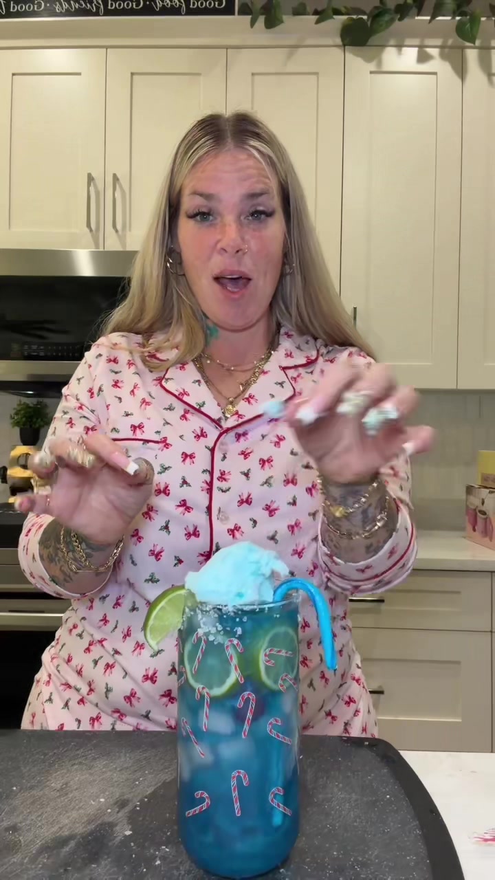 TikTok post by @itsmamacookie for Ultima Replenisher. Caption reads: Let’s make a holiday @Ultima Replenisher drink 🖤....