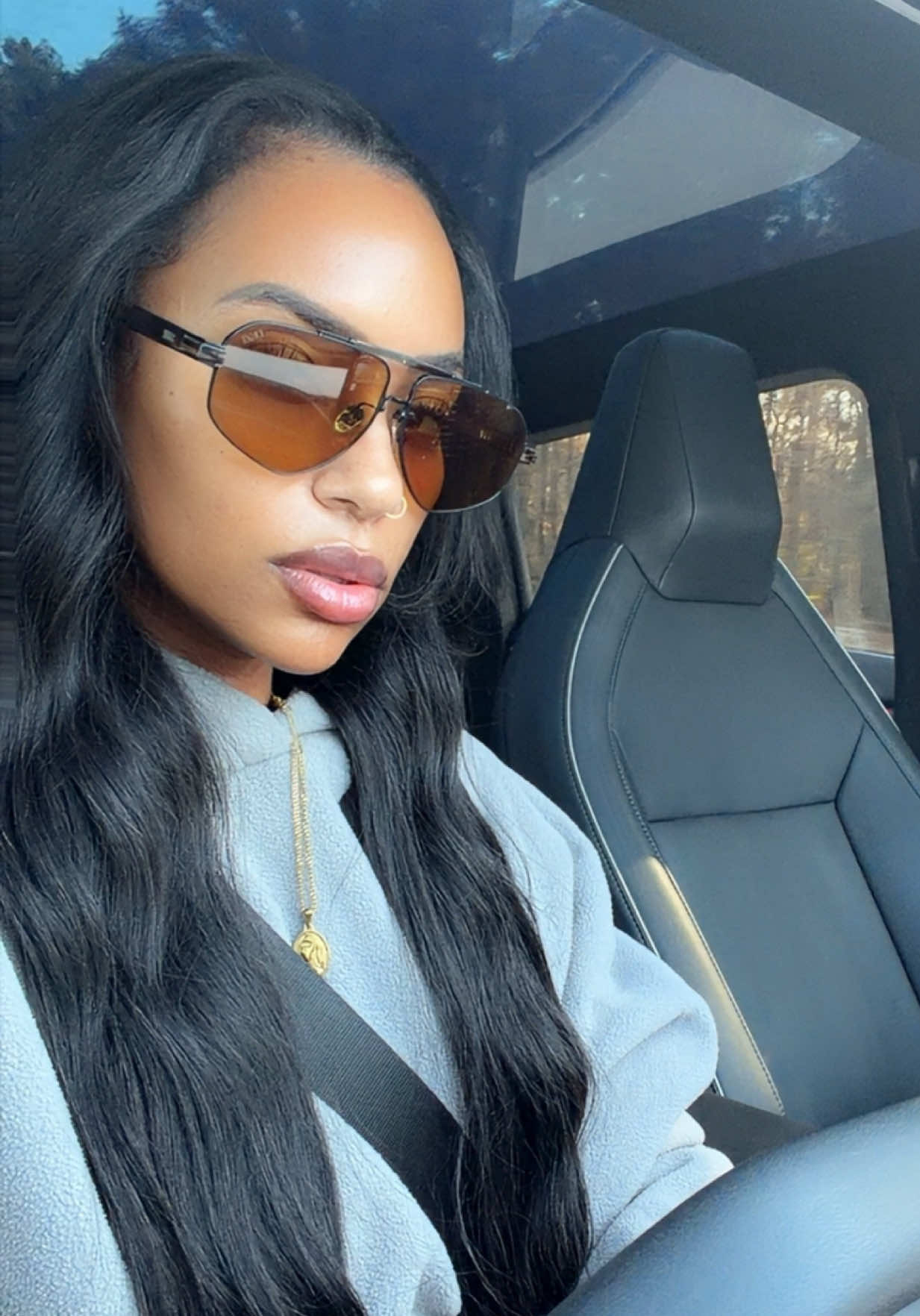 TikTok post by @3astafricangirl for DEZI. Caption reads: @DEZI EYEWEAR #sunglasses #womensfashion [...].