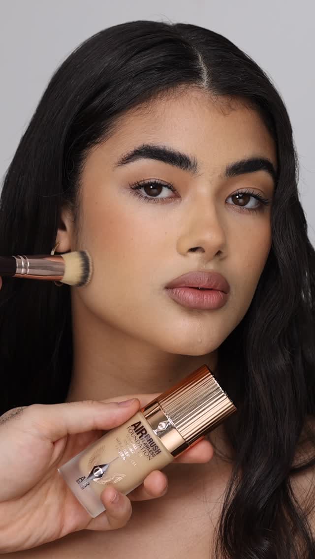 Instagram post by @hindash for Charlotte Tilbury. Caption reads: AIRBRUSH FLAWLESS FACE ✨🪽 full face of....