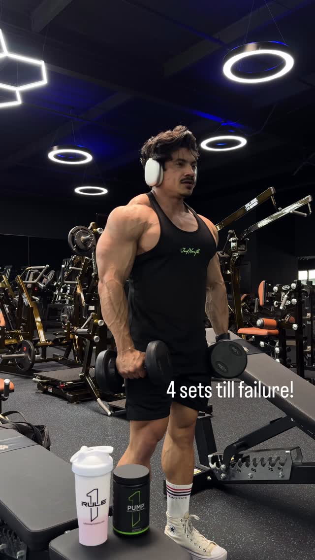 Instagram post by @dinoestrada14 for Rule One Proteins. Caption reads: Here’s my go-to workout for shoulders! What’s your....