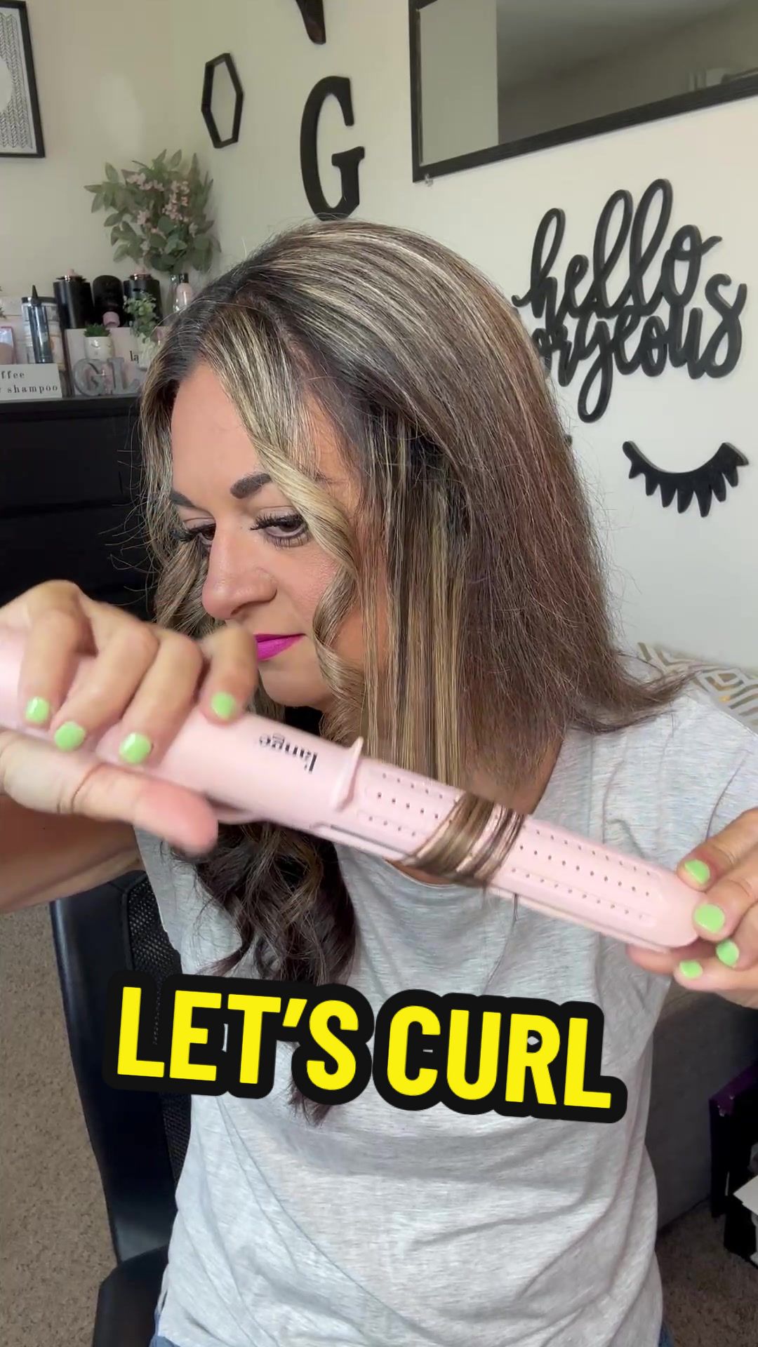 TikTok post by @ginadinko for L'ange Hair. Caption reads: Curling your hair has never been easier! Lean in....
