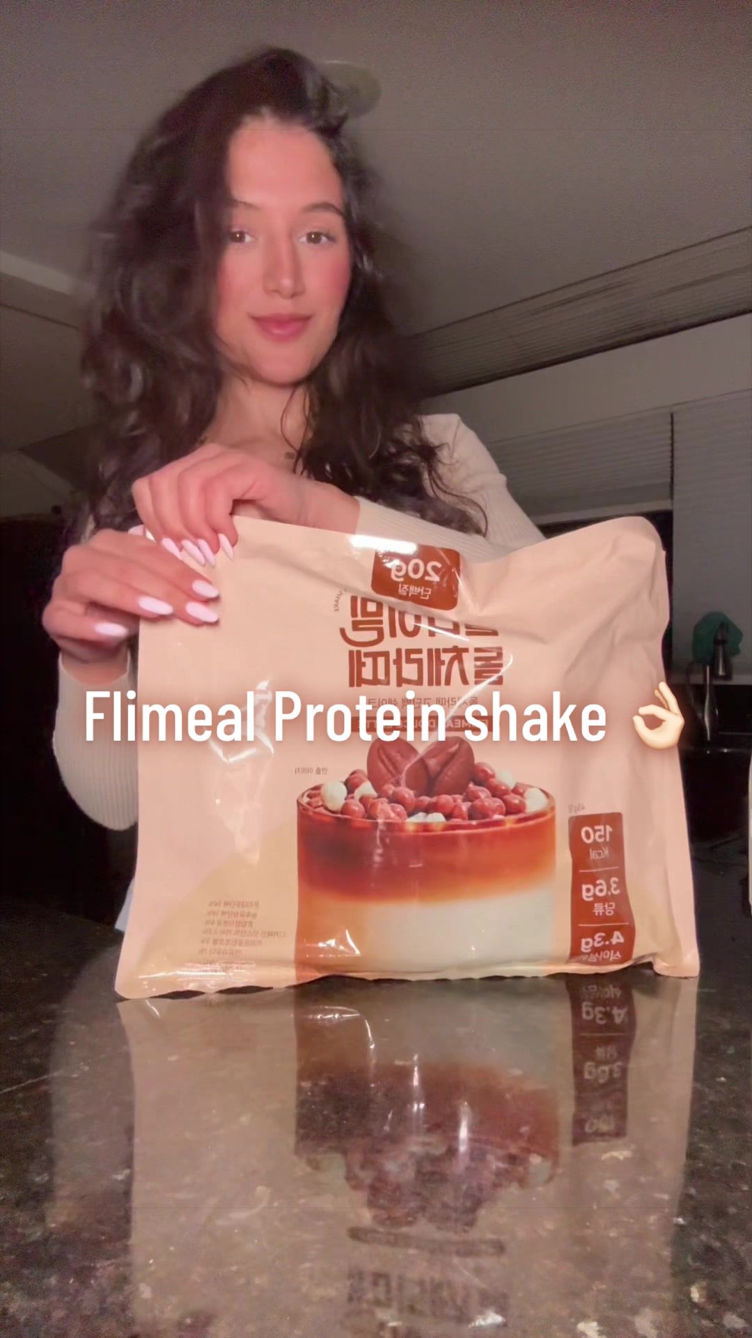 TikTok post by @joelles.bitar for Fullight_global. Caption reads: Trying the Flimeal Protein Shake from Fullight for....