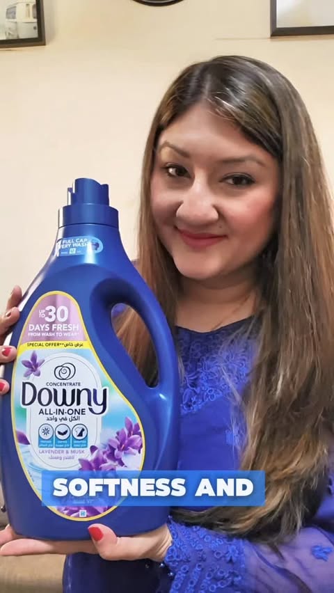 Instagram post by @aynees_world for ELITELIFE COLLAB. Caption reads: “Transform every wash with Downy Fabric....