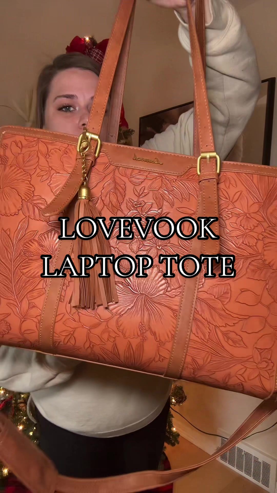 TikTok post by @akerspartyof6 for Lovevook. Caption reads: [...] color before it sells out! @Lovevook Bags....