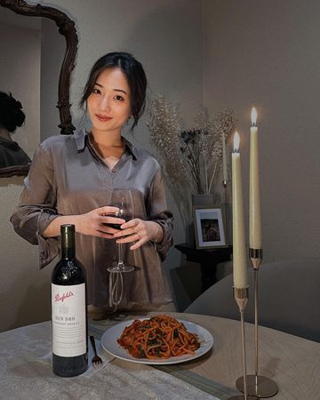 Instagram post by @sallykim7 for Penfolds Wines. Caption reads: One of my goals for 2022 is to slow down, reflect,....