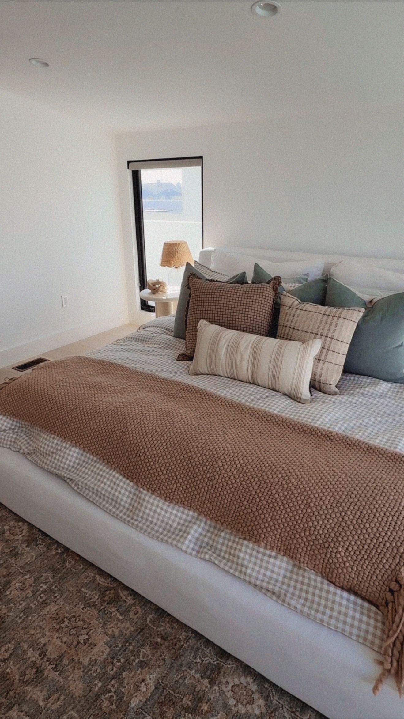 Instagram post by @aspynovard for Loloi Rugs. Caption reads: guest room is getting a mini makeover!! new rug....