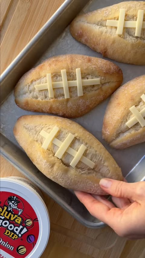 Instagram post by @ainttooproudtomeg for Hood. Caption reads: Make these yummy Football Subs 🏈 & serve them up....