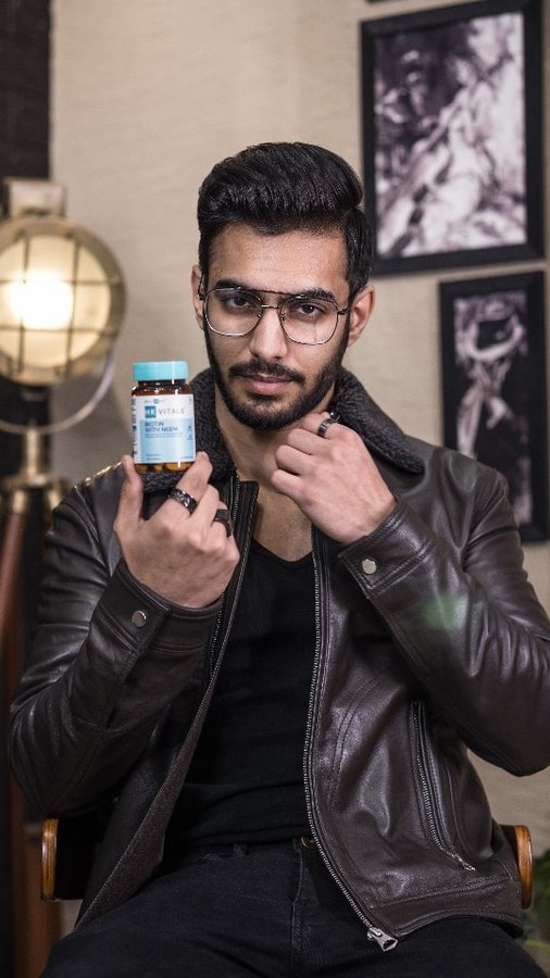 Instagram post by @theindianmessieurs for HealthKart. Caption reads: Tired of dandruff falling like snow? HK Vitals is....