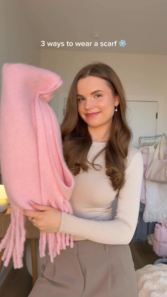 Instagram post by @fit_withdora for PrettyLittleThing. Caption reads: Time to get your chunky scarves out! 💗....