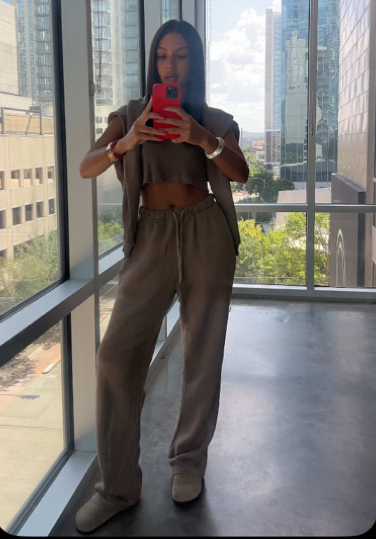 TikTok post by @kkyliemeyers for Elwood Clothing. Caption reads: monochrome sets!!! @Elwood #monochromeoutfit....