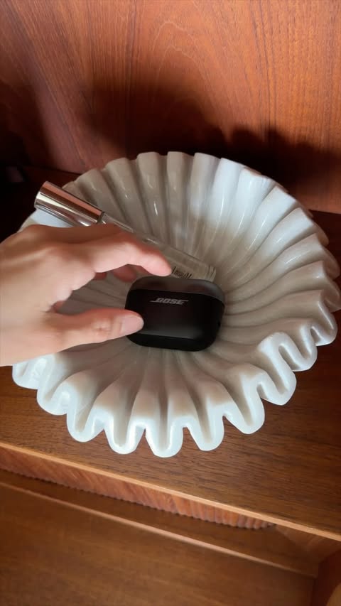 Instagram post by @sophiachang for Bose. Caption reads: the @bose sport open earbuds are the only earbuds....