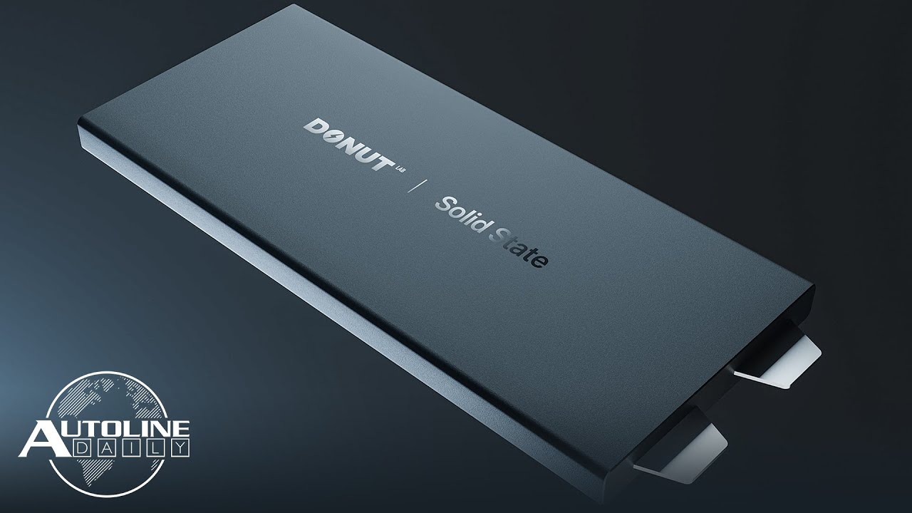 YouTube post by @AutolineDetroit for Bloomberg. Caption reads: China: Donut Battery Is A Scam; Cadillac Carries....