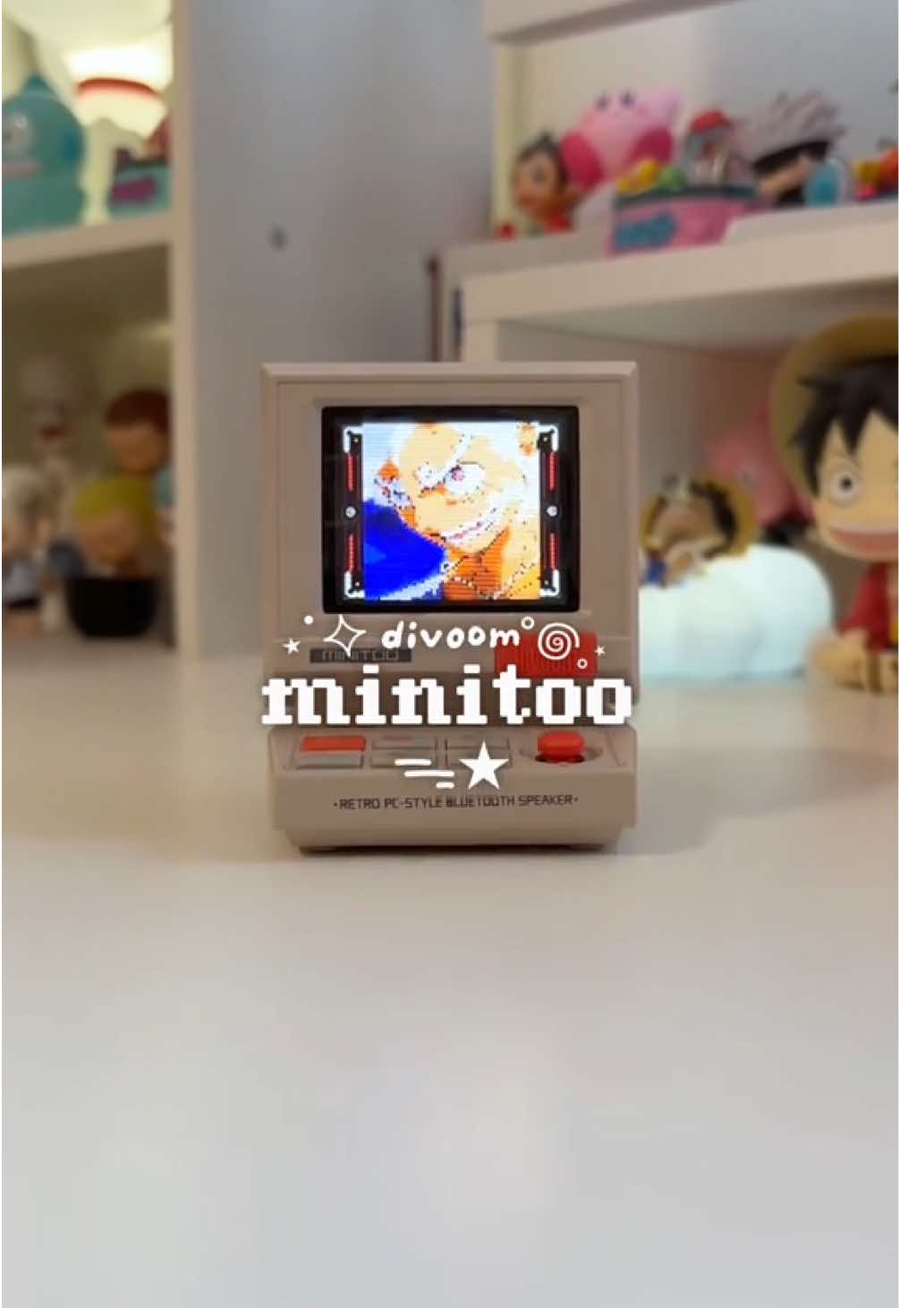 TikTok post by @crystalkalia for Divoom. Caption reads: OBSESSED!!! TYSM @Divoom  #divoom #minitoo....