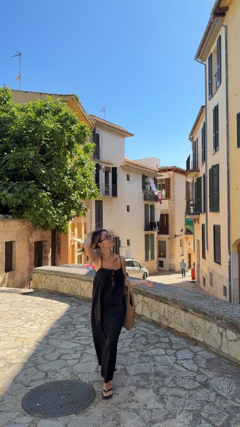 Instagram post by @marci for ABOUT YOU. Caption reads: [...] coffee hopping in Palma outfit by....