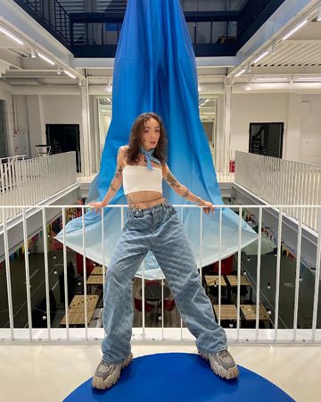 Instagram post by @dressedforspacee for Hypebae. Caption reads: blue Lagoon🐬.