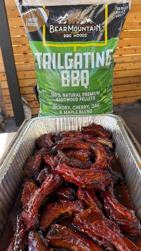 Instagram post by @cooking_with_fire___ for Bear Mountain BBQ. Caption reads: Dr Pepper Smoked Party Ribs....