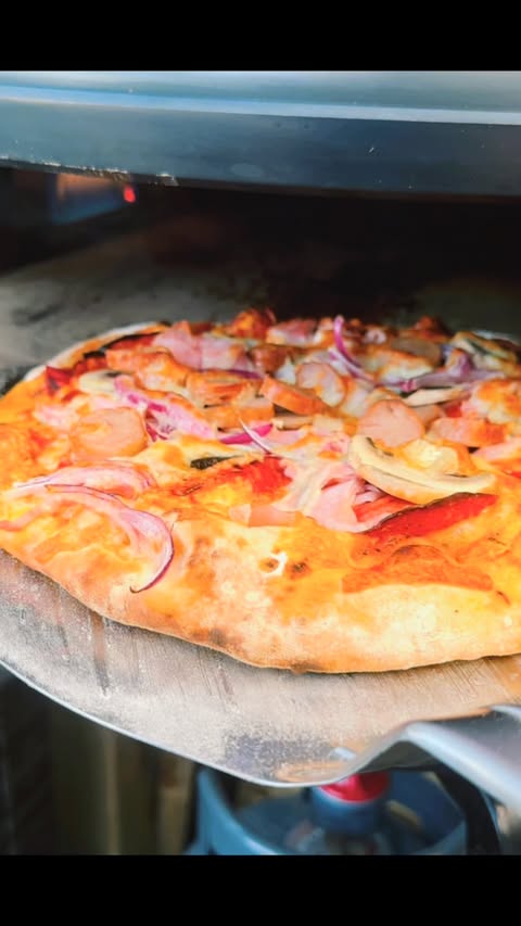 Instagram post by @macksbbq for JD’s Hot Honey. Caption reads: Pizza Night !!! Meat feasts all round by mine was....