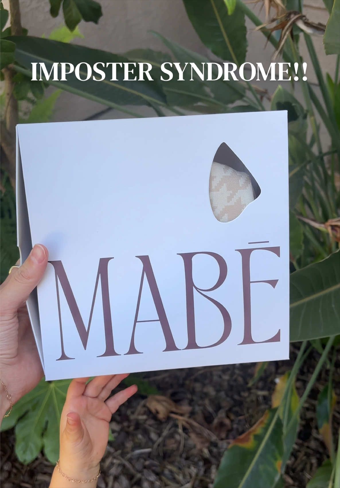 TikTok post by @journeysouza for MABĒ Carriers. Caption reads: [...] Major imposter syndrome bc I love @MABĒ....