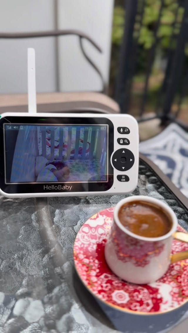 Instagram post by @aysegulamerikada for HelloBaby. Caption reads: Obsessed with my HelloBaby monitor — 5-inch....