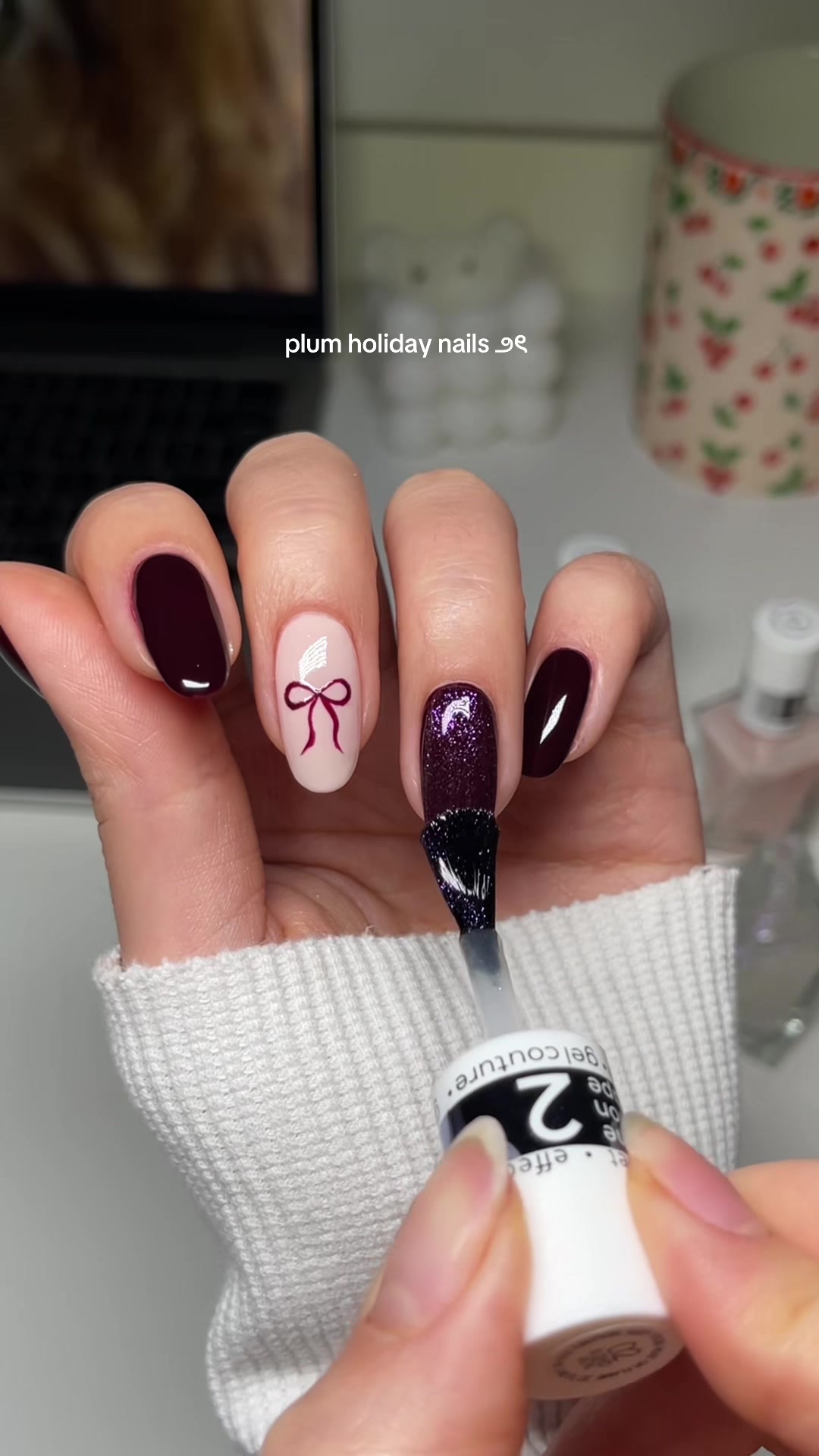 TikTok post by @heluviee for essie. Caption reads: berry tones + the prettiest shimmerr ✨🍇🎀 @essie....