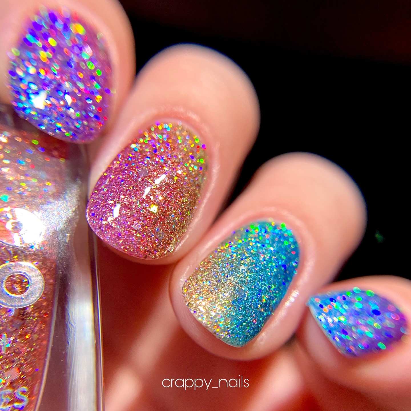 Instagram post by @crappy_nails for Holo Taco. Caption reads: *pr* I did a mani for launch day!! 😍🙌 This is....