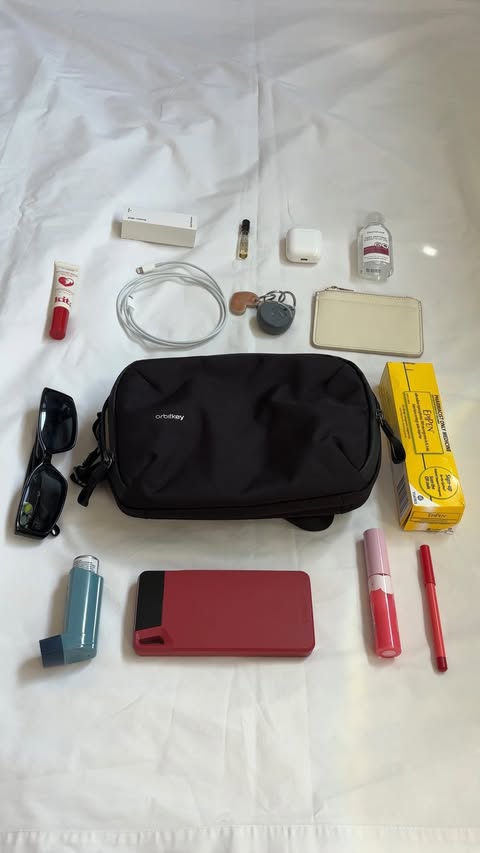 Instagram post by @angeliqueargiros for Orbitkey. Caption reads: A travel bag for all occasions @orbitkey When....