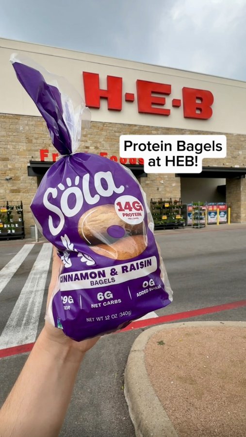 Instagram post by @grocery_obsessed for The Sola Company. Caption reads: Sola has a new protein bagel flavor at @HEB! ....
