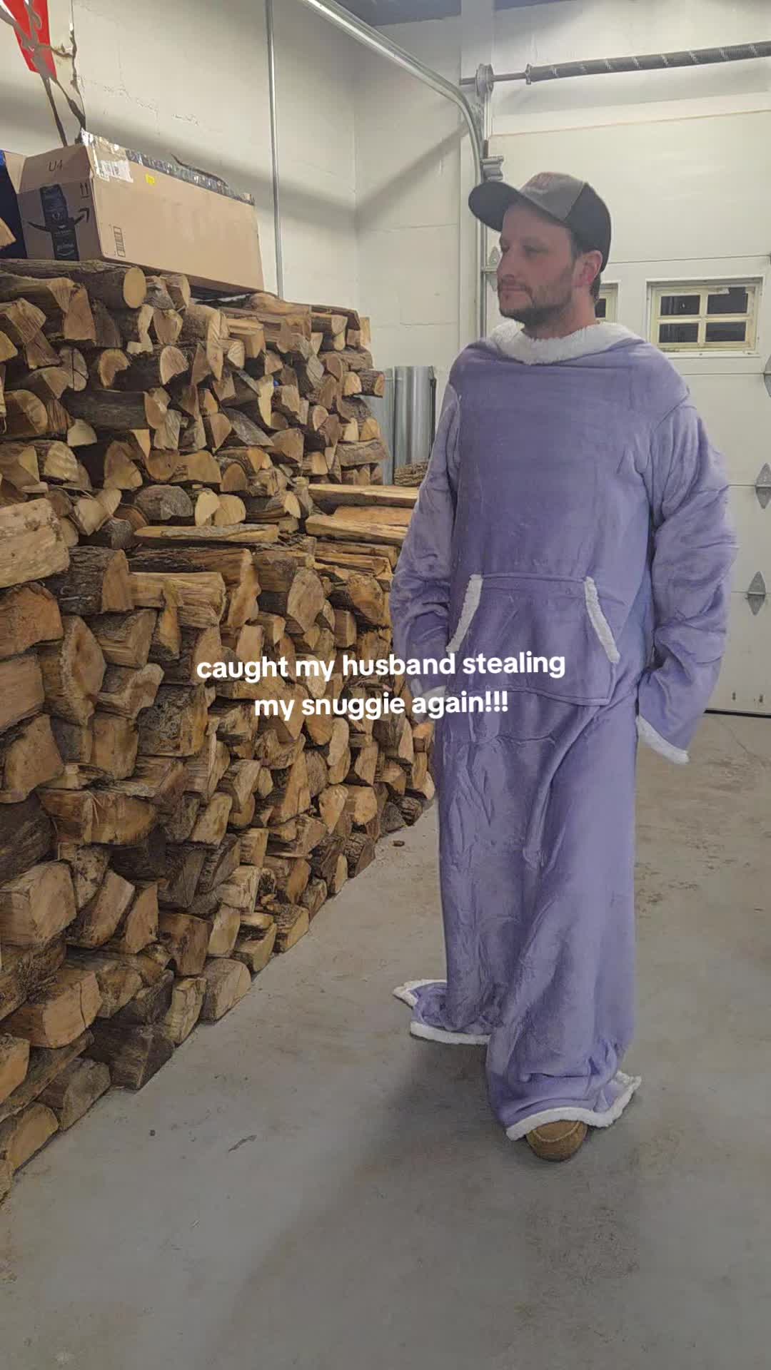 TikTok post by @littlepolamalu for Snuggie. Caption reads: Warm and Cozy @Snuggie #snuggie #warm #cozyathome....