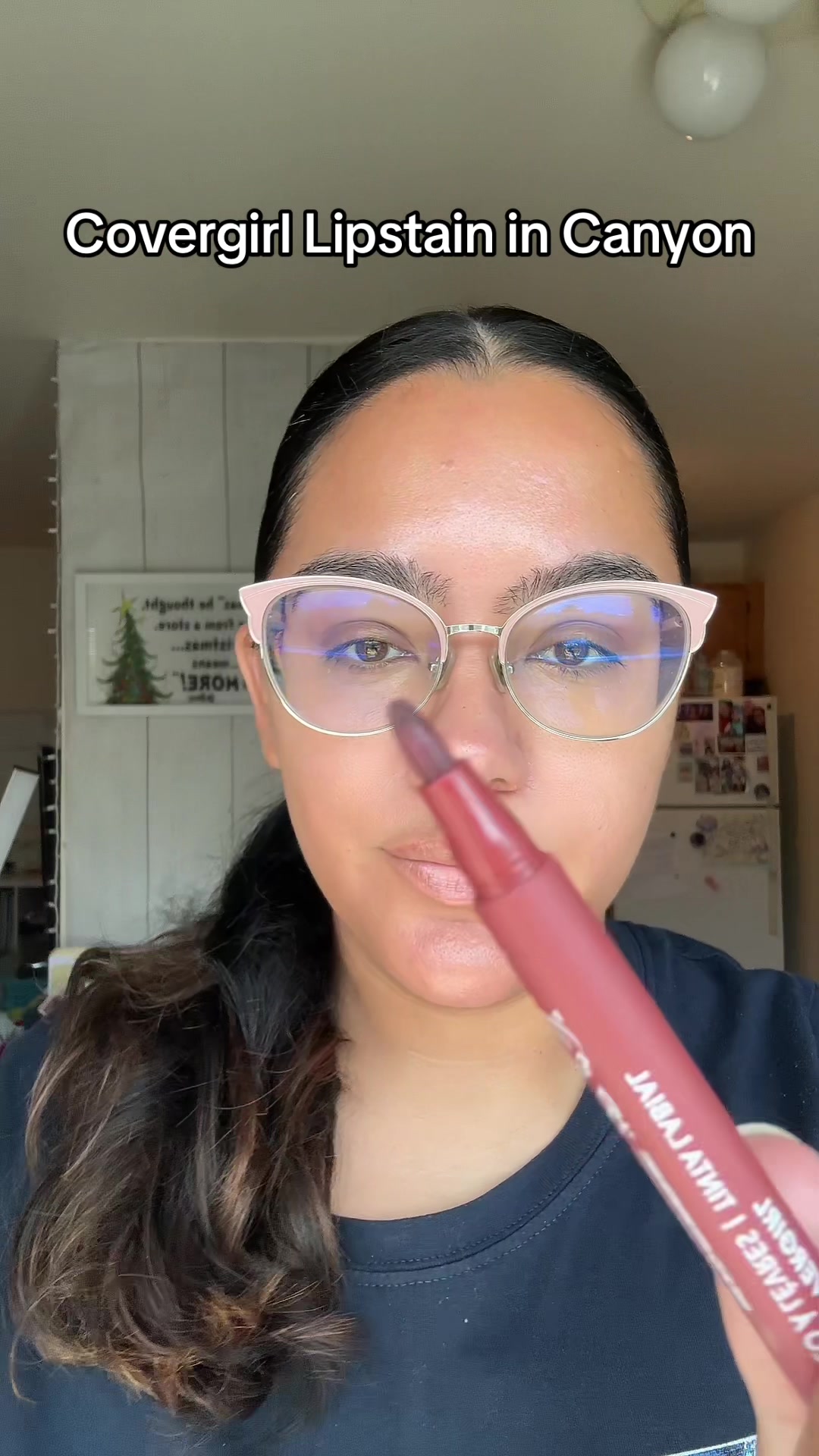 TikTok post by @thenotarichgirl for COVERGIRL. Caption reads: CoverGirl Lipstain in Canyon @COVERGIRL [...].