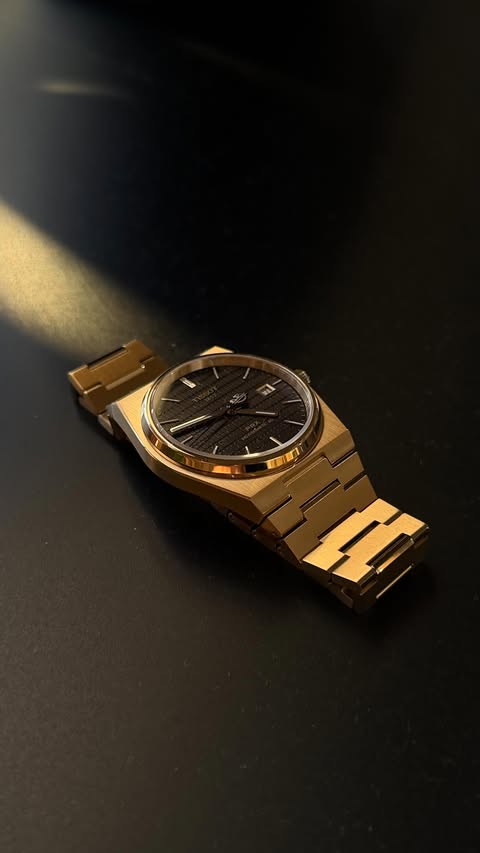 Instagram post by @bryant.chao for TISSOT. Caption reads: [...] a gold watch look with 900 USD....