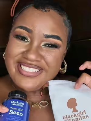 TikTok post by @divateetee for Black Girl Vitamins. Caption reads: [...] grogginess #BGV #BGVSLEEPGUMMIES....