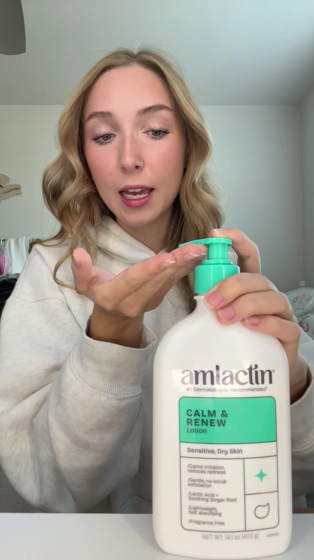 TikTok post by @emmalizzz for AmLactin. Caption reads: meet my sensitive skin bestfriend 🩵 @Amlactin #Ad....