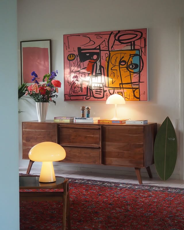 Instagram post by @maison_artmots for The Poster Club. Caption reads: A slow Sunday at home. Flowers on the sideboard,....