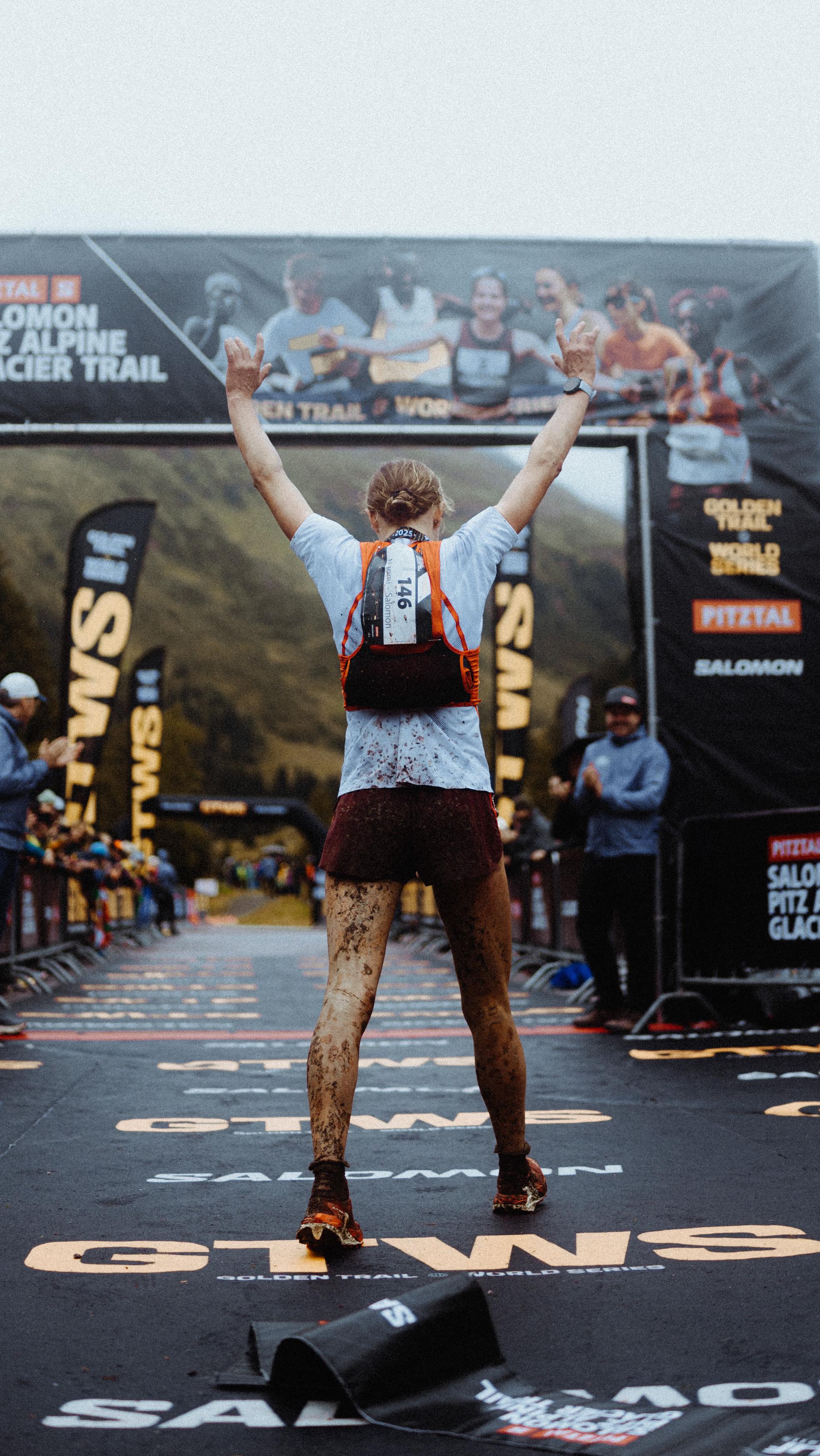 Instagram post by @goldentrailseries for Salomon. Caption reads: @naomi_lang__ WINNER OF @pitzalpineglaciertrail....