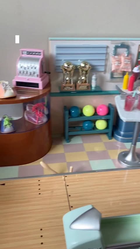 Instagram post by @defintiely for Our Generation Dolls. Caption reads: Let’s set up my bowling alley by @ogdolls 🫶🏻🎳✨....