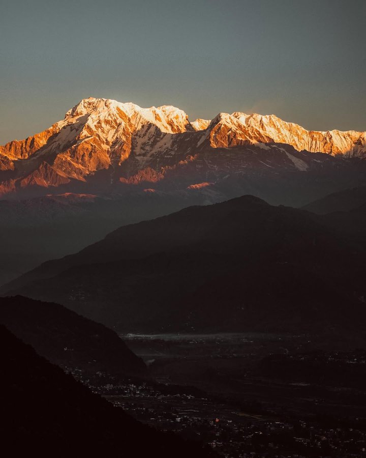 Instagram post by @sjoerdbracke for Earth. Caption reads: On the edge of the Himalayas! This was an unreal....