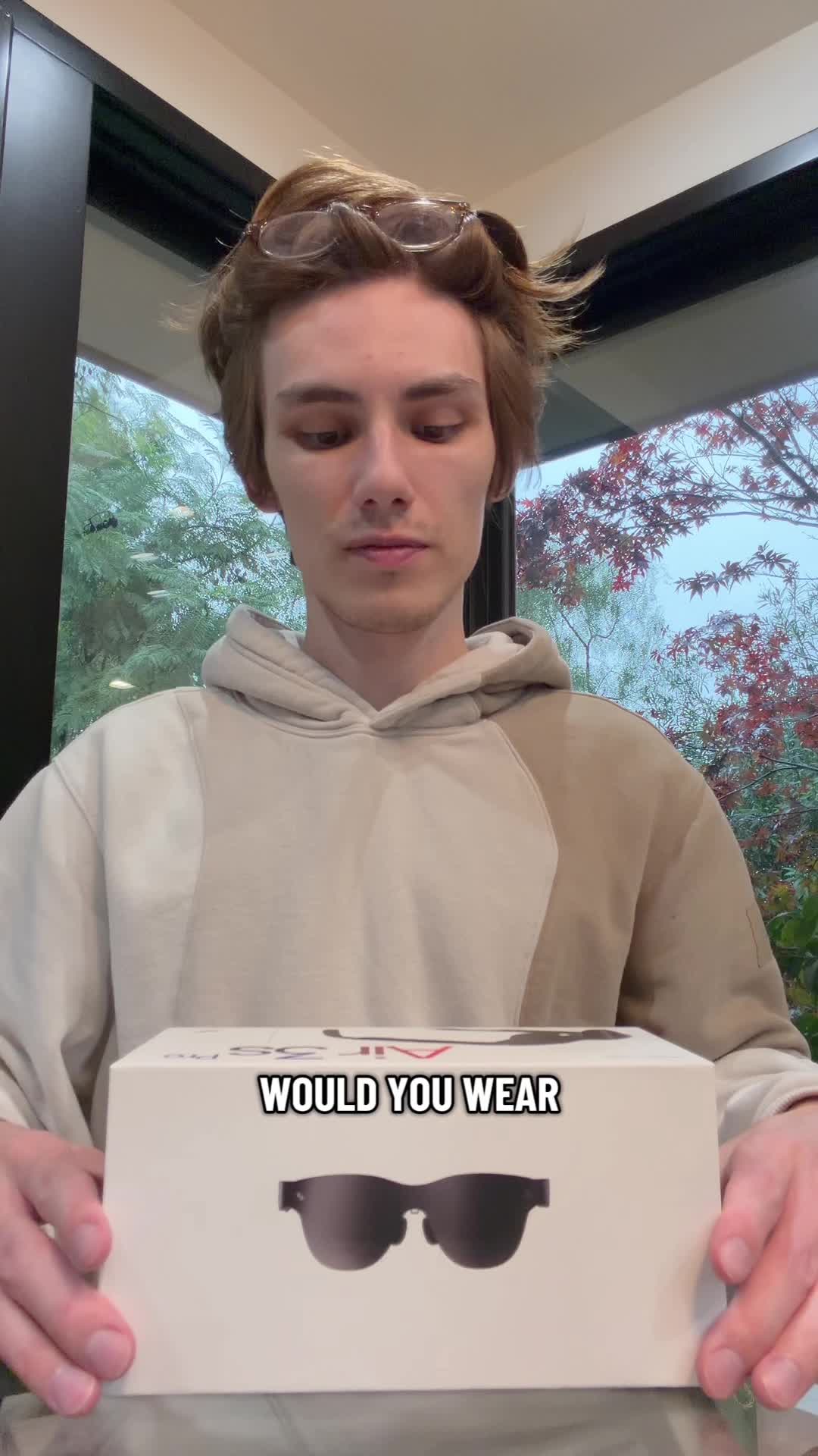 TikTok post by @hitomidocameraroll for RayNeo. Caption reads: [...] class picture for a best in class price....