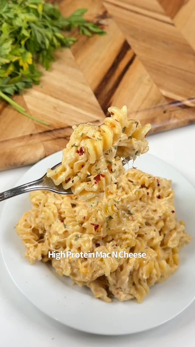 Instagram post by @ketosnackz for Aquasana. Caption reads: [...] this High Protein Mac N Cheese 🤤🙌🧀....