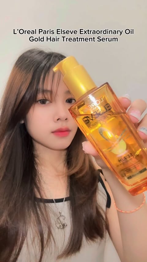 Instagram post by @nellyhuanggg for L'Oréal Indonesia. Caption reads: luv bgt hair serum dari @lorealparis ngebantu bgt....