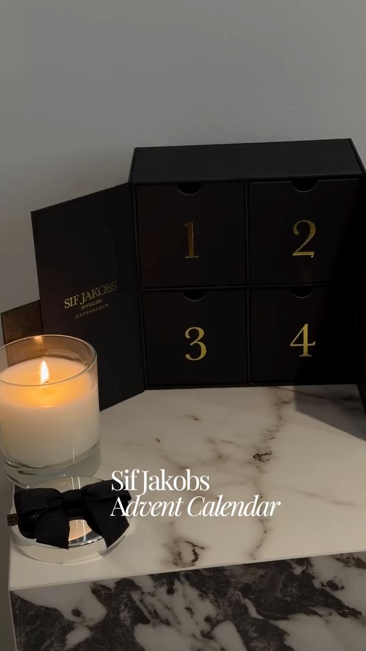 Instagram post by @elvirapitznerofficial for SIF JAKOBS JEWELLERY. Caption reads: Golden glow, soft light, quiet luxury 🌛🕯️....