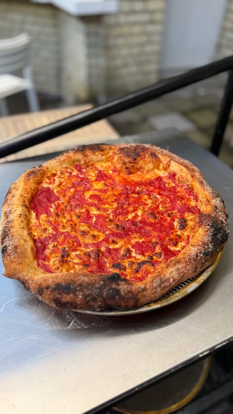 Instagram post by @dough_and_behold for Ooni. Caption reads: [...] for inspiration Tony G! Cooked on my @oonihq....