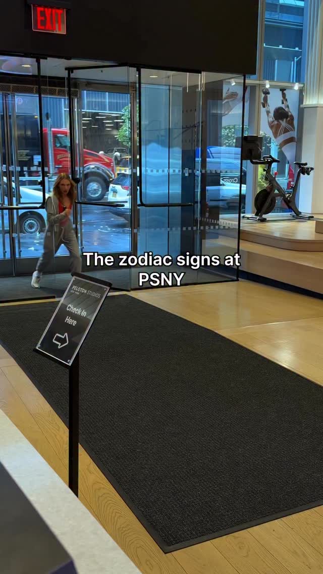 Instagram post by @la_tiamariana for Peloton. Caption reads: Which sign are you today? Sound off below 🔮👇✨.