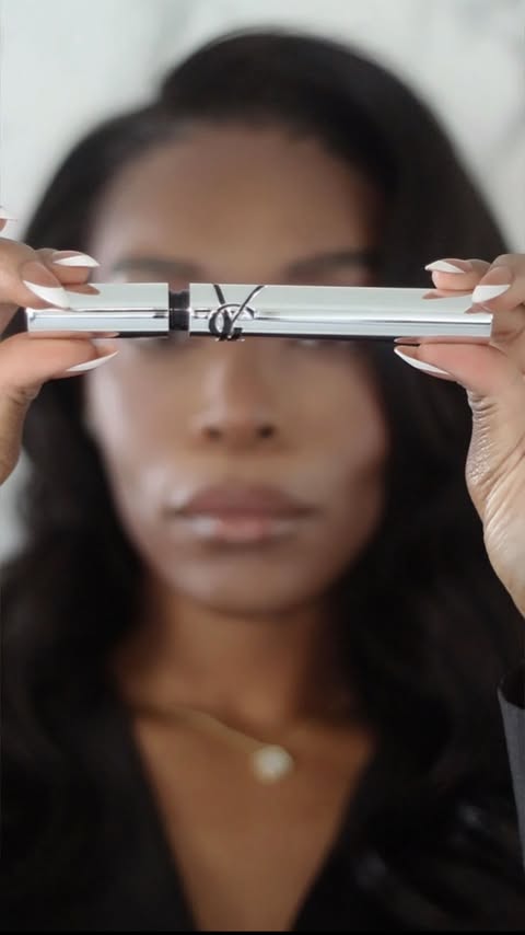 Instagram post by @amwstyled for YSL Beauty. Caption reads: Trying the NEW @yslbeauty Lash Latex Lengthening &....