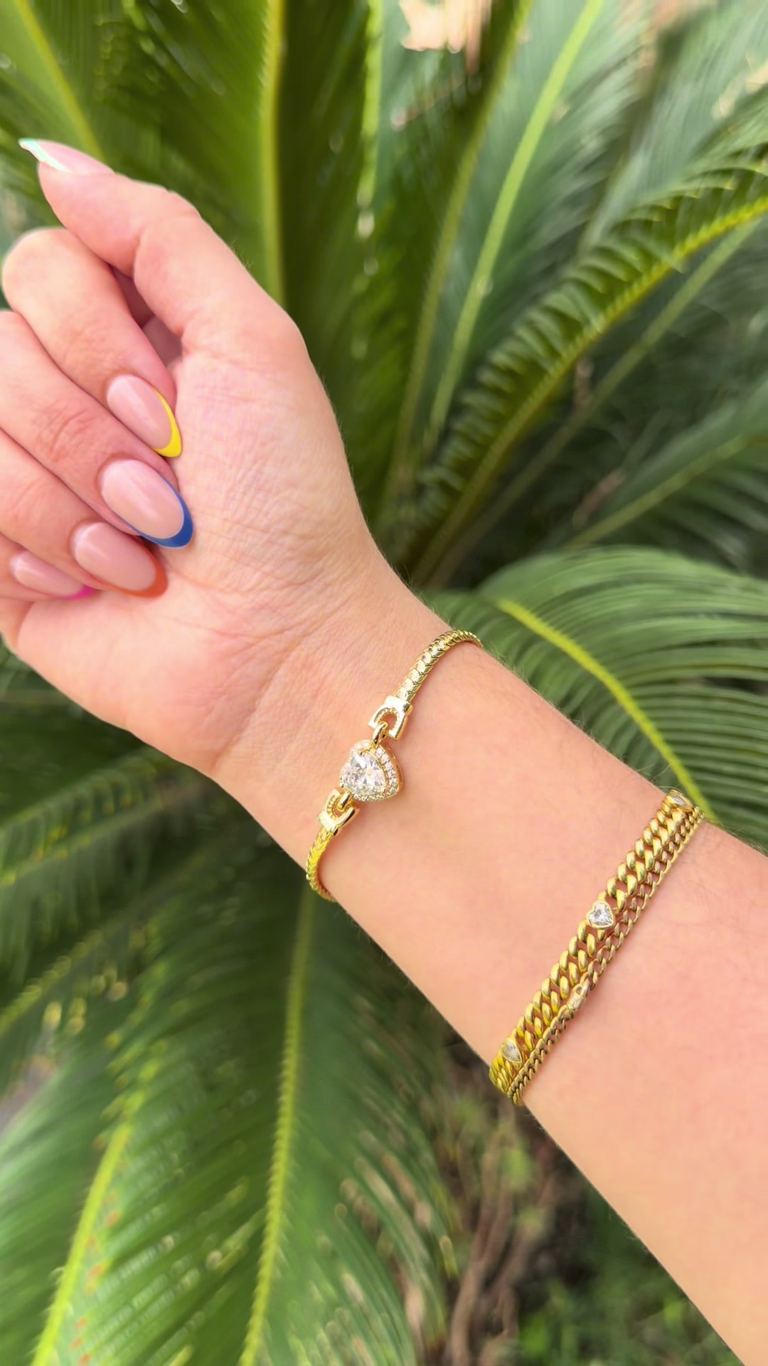 TikTok post by @suzy.xo_ for TimelessDream. Caption reads: in looove with this heart bracelet 💕✨ @MEIITRUE....