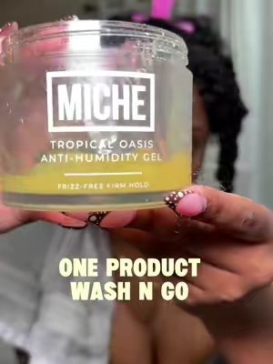 TikTok post by @dgoingrogue for MICHE Beauty. Caption reads: [...] for a long lasting wash n go🤌🏾😍 @MICHE....