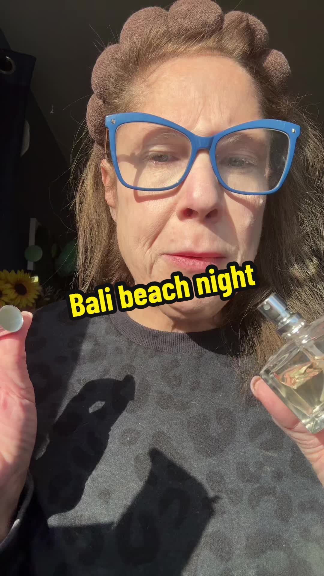 TikTok post by @iamcallmetarajay for Beachwaver. Caption reads: [...] #budgetperfume #discontinued @TheBeachwaver.