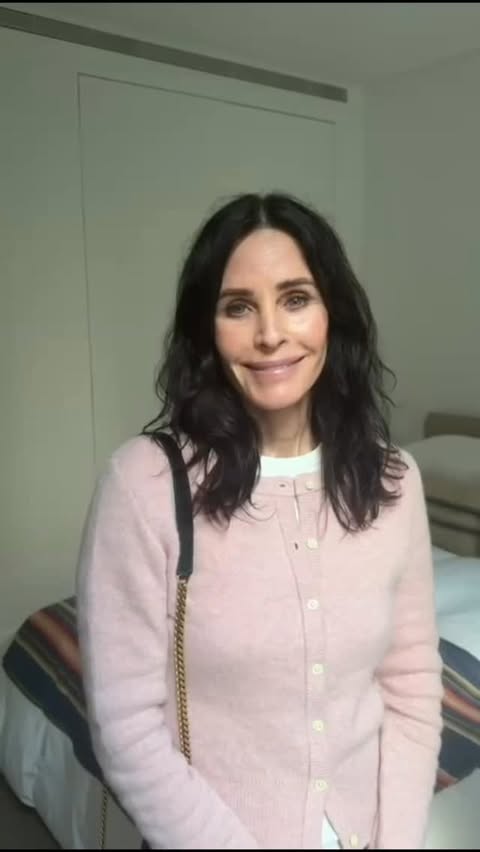 Instagram post by @courteneycoxofficial for JustGiving. Caption reads: Day 335

✨ WIN a @ysl handbag from Friends legend....