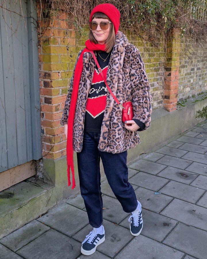 Instagram post by @mumzinthehood for Gini London. Caption reads: [...] . . . . . Faux fur leopard print coat....