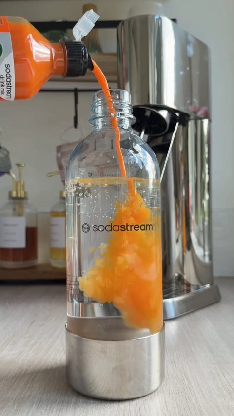 Instagram post by @sss.sophiie for SodaStream. Caption reads: [...] popcorn ✅ Unlimited fizzy drinks ✅....