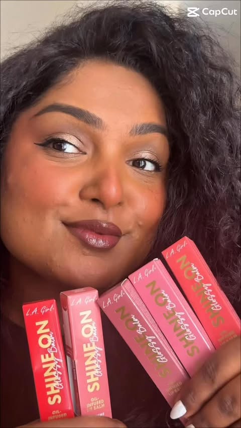 Instagram post by @makeupmagicbyrashel for L.A. Girl Cosmetics. Caption reads: Trying the new @lagirlcosmetics Shine On Glossy....